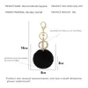 Keychains Fashion Letter Keychain Trendy Creative Black Fluff 26 Engelska Inledande diamanthandväsktillbehör för kvinnor238R