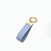 Yüksek kaliteli moda kadın erkek anahtarlıklar alaşım moda el yapımı anahtarlık alaşım deri şık anahtar toka kutusu ile