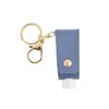 Nyckelringar Läcksäker hand sanitizer Plast Keychain Bottle Key Ring Läder tom resor 30 ml tofsar med SMAL22