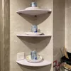 white corner shelves