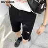 Bivigaos Mulheres Verão Preto Estiramento de Calças de Calças de Calças Casuais Motociclista Slim Fino Skinny Rasgado Joelho Buraco Buraco Curto Denim 210724