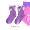 Printemps nouvelles couleurs de bonbons bébé genou chaussettes hautes filles garçons enfant en bas âge arcs infantile mignon chaussettes 0-12 ans en gros15 paires/30 pièces