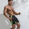 Мужская новая тонкая сечение цвета Соответствующее спортивное ветер три очки пляжные брюки фитнес бегущий мода многокарманские шорты мужчина x0316