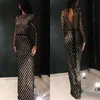 女性のスーツのブレザー女性の黒いスパンコールのドレス長袖の背中の背景の赤いMidi Dressesナイトクラブ服ファッションの衣装