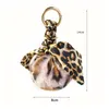 Breloki 14 cm Leopard Drukuj Pompon Brelok Puszyste Faux Fur Ball Kobiety Torebki Wisiorki Samochód Key Ring Łuku Łańcuchy Biżuteria