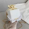 Petites dames sacs à main perle chaîne haut-poignée sac seau en cuir couleur bonbon sac à main marque bandoulière sac à bandoulière pour les femmes vente