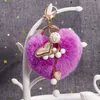 Pendentif en fourrure coeur Porte-clés Porte-clés Boule Balle Shape Opal Love Perles Femmes Girls Sac Charms Bijoux Accessoires Mode Voiture Clé Chaîne Titulaire