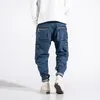 Mode män jeans hög kvalitet lös passform stora fickor denim lastbyxor homme streetwear hip hop wide ben byxor245d