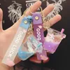 Creative Cute Milk Tea Cup Floating Bottle Dream Quicksand Keychain Bag Charm Pendant Car Key Keychains Key Rings Accessories G1019