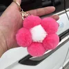 Nyckelringar pompom kvinnor kreativitet smycken päls blomma nyckel kedjanhållare för bilnycklar anime tillbehör diy nyckelring