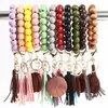 Monogrammed Elastic Beads Braceletes Favor Michas De Madeira Tassel Bangle Metal Round Ring Chaveiro Mini Pingente de Carro 18 Estilos