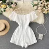 Sexig snedstreckkvinnor Jumpsuits Sweet Ruffles Hollow Solid Rompers Summer Fashion Wide Leg Short Rompers 210715