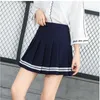 Jupes COCKCON Femmes Court Lolita Style Harajuku Kawaii Doux Rayé Mini Mignon Uniformes Scolaires Saia Faldas Dames Jupe