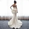 2021 Luxury Mermaid Wedding Dresses Sheer Neck Long Sleeves Illusion Full Lace Applique Bow Overskirts Button Back Chapel Train Go232a