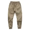 Harem Pants Solido elastico in vita da uomo Pantaloni Casual giapponese Streetwear Uomo Hip Hop Abbigliamento Moda maschile Pantaloni larghi 210715