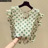 green polka dot top