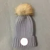 Chapeau tricoté Bonnet de luxe Design boule de fourrure de raton laveur vent étiquetage chapeau de laine chaud unisexe AAAAA haute qualité livraison rapide2599070