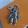 Stylish astronaut key chain designer Titanium steel matching gift box