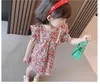 子供のためのフリルの装飾ドレス2021ファッション子供の夏の服のノースリーブプリントドレス女の子の王女AラインのドレスQ0716