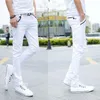 Mäns jeans vår och höst 2021 Tunna elastiska långa byxor Casual Student Koreanska vita smala
