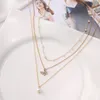 Anhänger Halsketten Trendy Mehrschichtige Schmetterling Perle Halskette Für Frauen Mode Sun Star Gold Choker 2021 Trend Schmuck Geschenk