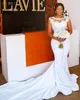 2022 Enkel Sexig sjöjungfru bröllopsklänningar Juvel nacke Illusion Lace Appliques Cap Sleeves Chapel Train Plus Storlek Satin Formell Bridal Dress Vestidos de Novia