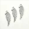 Лот 50 шт. Angel Wings Tibetan Серебряные подвески Подвески для ювелирных изделий Изготовление серьги Ожерелье Браслет Ключ Цепные аксессуары 33 * 12 мм DH055