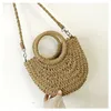 HBP Non-Brand Paper rope fashion versatile hand-held Crossbody small round bucket hand woven straw bag girl sport.0018