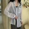 Été Sexy Voir à travers Blouse Dames Blanc Transparent Manches longues Turn-Down Boutons Tops Chemises Femmes Mousseline de soie 210601