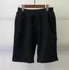 Pantaloni per uomini pantaloni solidi jogger spiaggia blu nera singola tasca a tasca corta pantaloni casual cotone