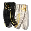 Hip Hop Homem Jogger Side Bolsos Loose Style Sweatpants Moda 2020 High Street Calças Casuais Masculino Oversize 4xL Y0927