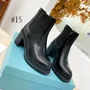 Nuevo diseñador de cuero y blanco Botines de tela de nylon negro Mujer Botines Cuero Biker Metal logo Botas Australia Botines Botas de invierno Tamaño grande 40-41-42 con caja