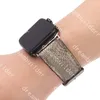 lüks tasarımcı sapanlar Saat Kayışı Watch Band 42mm 38mm 40mm 44mm iwatch 2 3 4 5 bantları Deri Kayış Bilezik Moda Çizgili