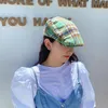 Japonés Retro Plaid Beret Femenino Verano Volver al desgaste Pat Cap Palabra Británica Joker Joker Coreana Versión Coreana Marea Adelante Mujeres Gorros Boinas