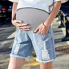 ベアーリーダーファッション夏の出生前の女性デニムショーツカジュアル妊娠中腹のズボン韓国のリッピングホール妊娠ジーンズショーツ210708