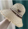 Sombrero de cubo de paja de moda Gorra para el sol para mujer Gorras de pescador de diseñador con cinturón Beanie Casquettes cubos de pesca sombreros patchwork Visera de verano de alta calidad