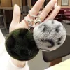 Regali creativi Favore di partito Leopard Fluffy Ball Portachiavi Borsa carina Ciondolo auto Pompon Love Portachiavi AccessoriT9I001298