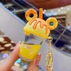 クリエイティブドーナツミルクティーカップキーホルダーキラキラクイックスズキーチェーン液体フローティングドリンクキーホルダーレディースバックパックペンダントギフトG1019