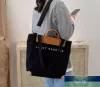 Mode reducerad design en axel duk väska ny messenger väska kvinnlig stor kapacitet på handväska