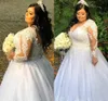 Plus Size Illusion Długim rękawem Suknie ślubne 2022 Sparkly Koronki Zroszony Sheer Jewel Neck Country Garden Bride Dress Suknie