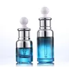 Måttligt pris 20ml 40ml Luxury Glass Dropperflaska Unik serum Blå färg med speciell