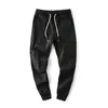 Mäns byxor läsbara avslappnade män Sweatpants Skinny Jogger Pant Harem Man Elastic Midje 4xl 5xl