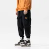 Streetwear Hip Hop Cargo Pants Uomo Donna Tasche Pantaloni da jogging stile coreano Pantaloni casual Harem Uomo Dropshipping X0723