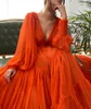 2021 Sexy Deep V Neck Illusion Orange Tulle Prom Dresses A Line Empire Puffy Long Sleeves Ruched Evening Party Gowns With Zipper Back Sheer Skirts Sweep Train Plus Size