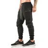 2020 Gym Män Byxor Fitness Casual Zipper Pocket Elastiska byxa Byxor Bomull Mens Gym Joggare Bodybuilding Byxor X0628