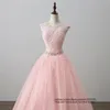 Sukienki quinceanera sukienki 2021 Różowe aplikacje księżniczki Scoop Crystal Party Prom Formal Tiul Tiul Freading Lace Up Ball Suknia Vestidos de 15 An