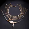 Braccialetti con ciondoli 1 Set braccialetto di conchiglie naturali di moda per le donne BOHO catena di perline color oro intrecciata a mano gioielli con nappa 2021