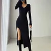 Mode-Frühling und Winter sexy französisches Schlitzpulloverkleid weiblich schlanke eng anliegende Hüftstrick-Overknee-Kleider