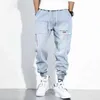 Джинсы мужские хип-хоп Color Color Color Cargo брюки свободно тепларуемые брюки гарема падение мужские пэчворки черные джинсы негабаритные джинсы X0621