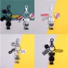 Resin keychain Cute fashion car accessories Creative transparent figures for both men and women manual DIY key chain